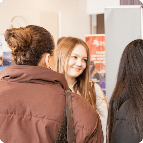 a group of young women at a careers fair